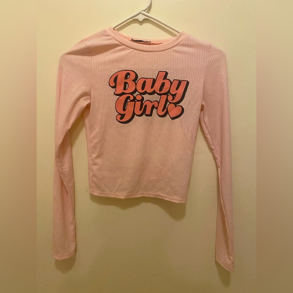Fashion Nova Light pink ribbed long sleeve “BabyGirl” cropped T